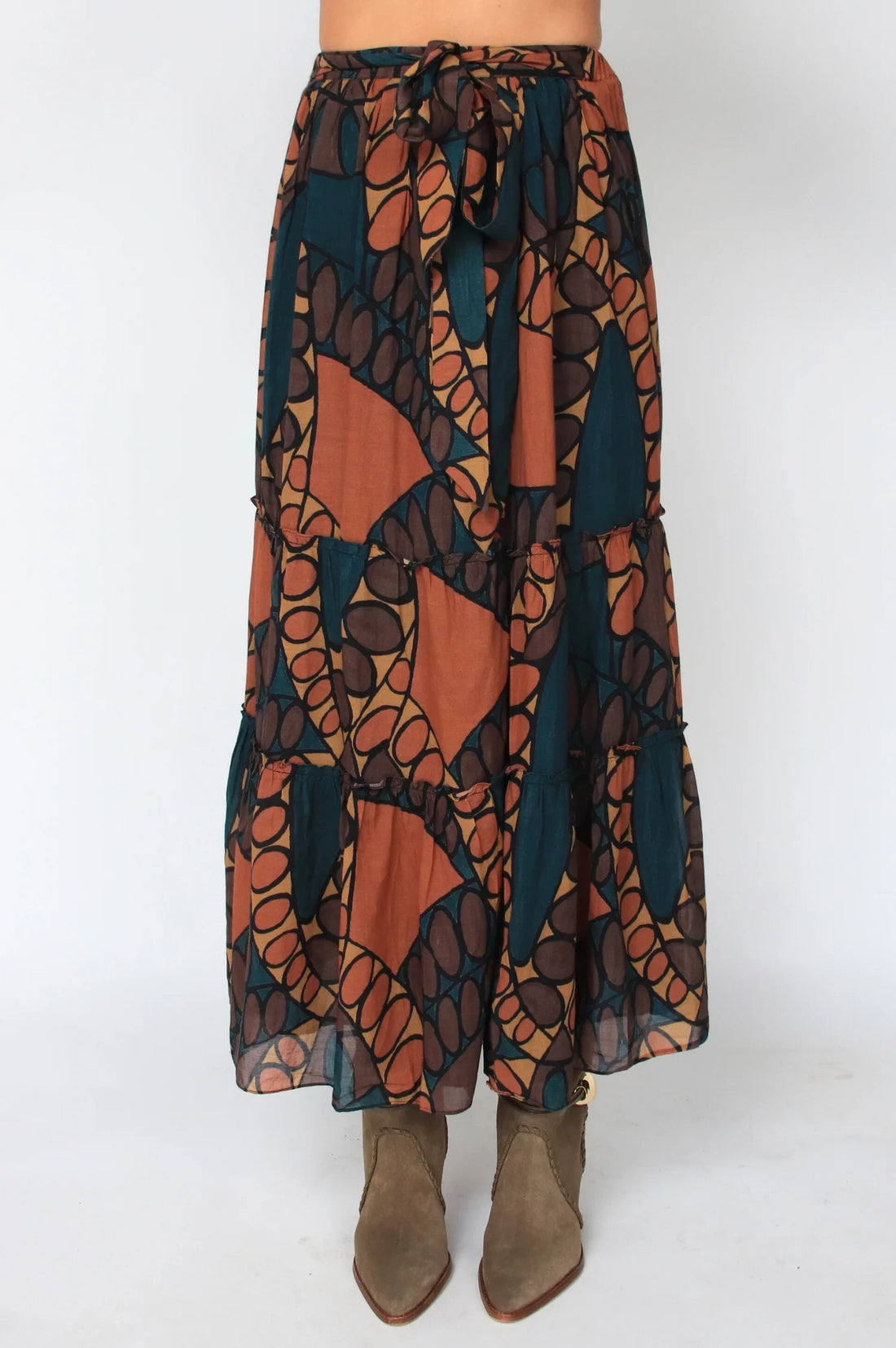 Long, patterned skirt with a white background