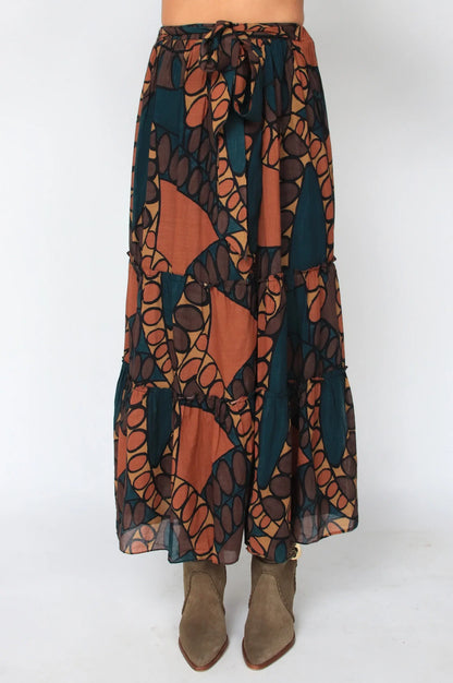 Long, patterned skirt with a white background