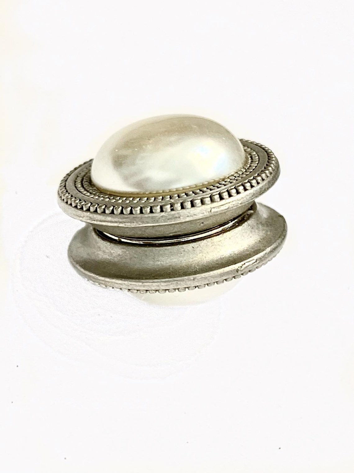 MagneButton Pearl Cream Low Dome accessory with pearl detail, designed for stylish clothing or accessories.