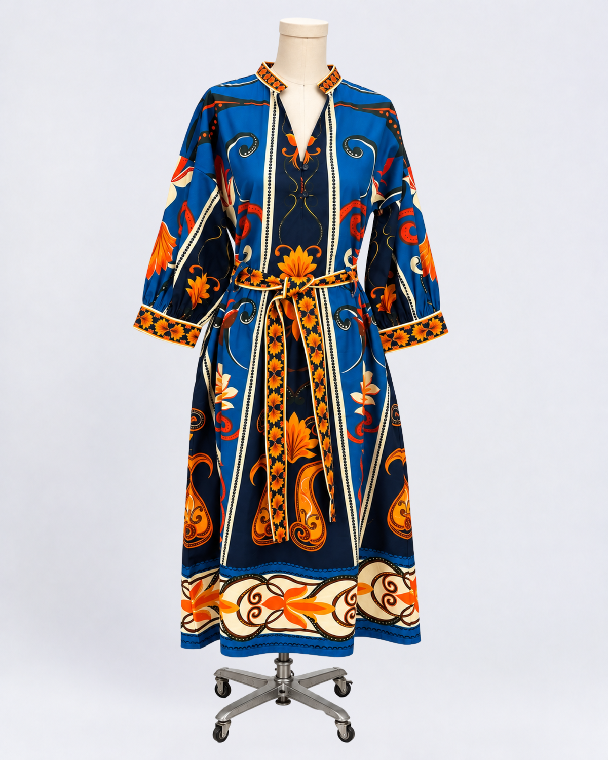 Maude Vivante blue and orange floral print cotton midi dress with three-quarter sleeves, V-neckline, and matching tie waist