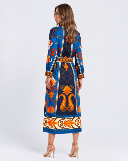 Maude Vivante blue and orange floral print cotton midi dress with three-quarter sleeves, V-neckline, and matching tie waist
