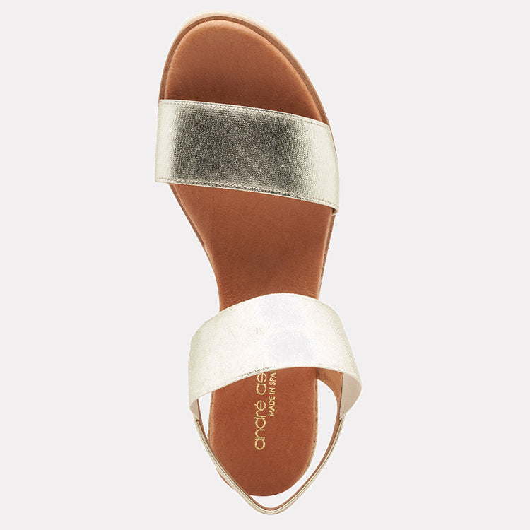 Andre Assous Neveah Metallic Wedge shoes with a shiny platinum finish, stylish and comfortable footwear for women.