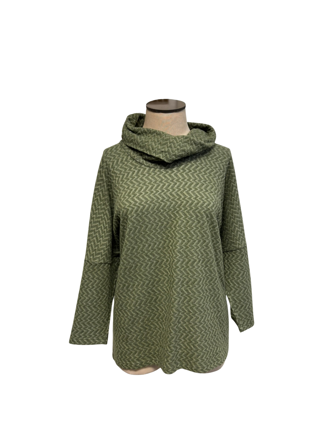Green patterned sweater on a mannequin against a white background