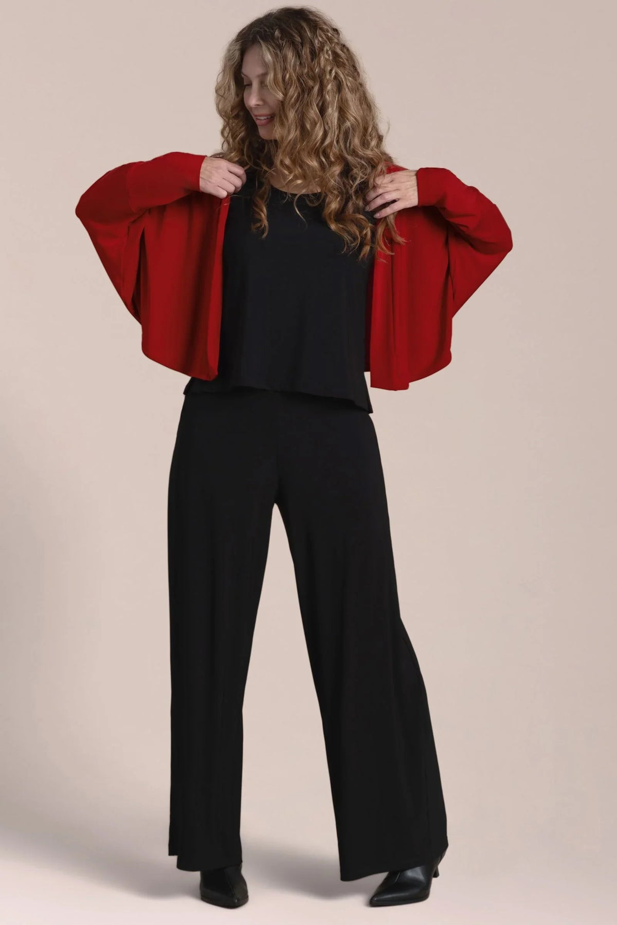 Red Honeycomb Shrug cardigan by SYMPLI featuring a textured honeycomb knit pattern, styled as casual outerwear.