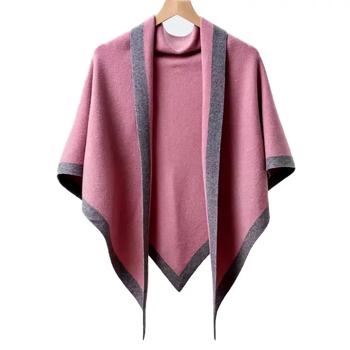 Pink poncho with gray trim on a white background