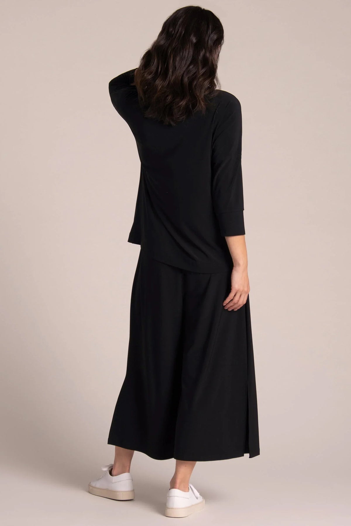 Black SYMPLI Slouch Sweatshirt with a relaxed fit, casual style, and soft fabric, perfect for comfortable everyday wear.