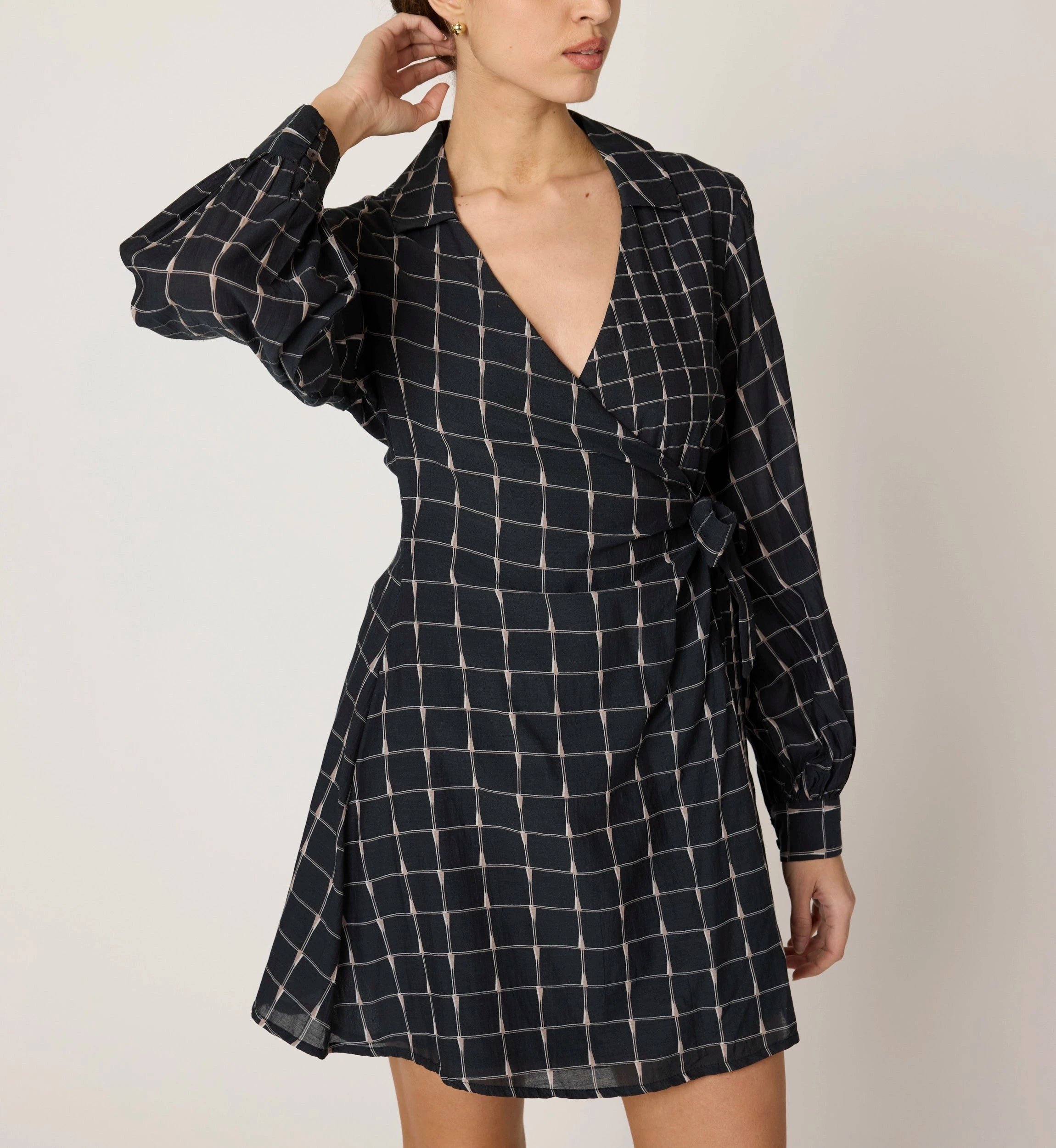 Talia Mini Dress by CLEOBELLA featuring a flowy silhouette, floral pattern, and adjustable straps, perfect for summer wear.