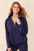A woman wearing a navy blue quarter-zip sweatshirt with white piping details tribal TECHNO LUX Pop Over Quarter Zip Pullover