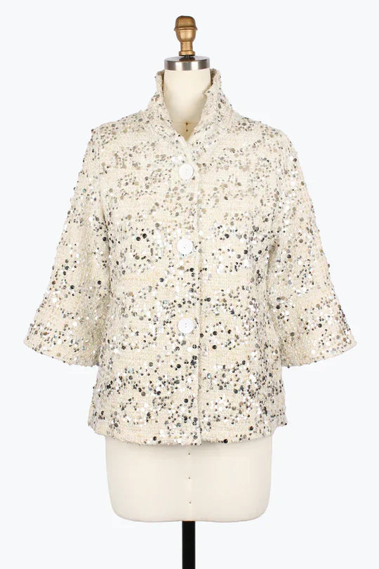 Sequined patterned jacket on a mannequin against a white background